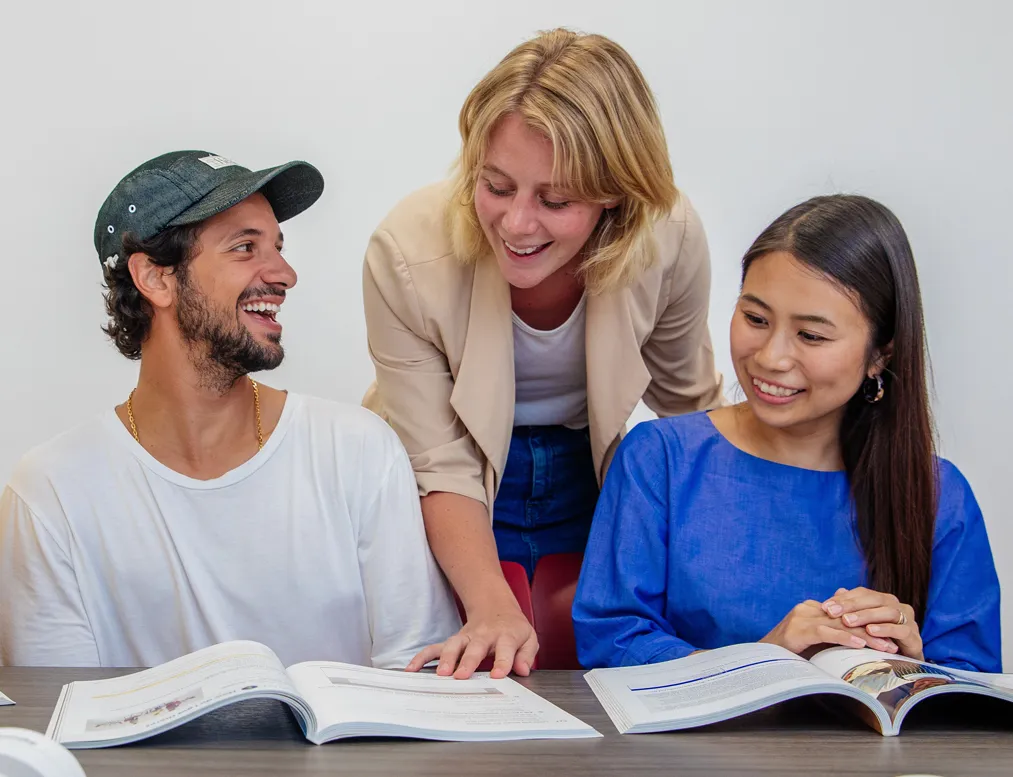 Rennert classroom with a teacher engaging two students